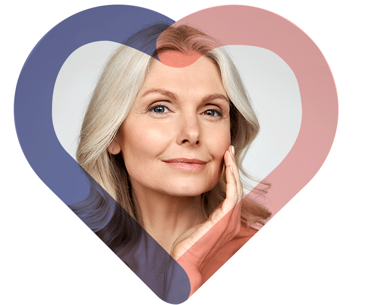 Woman looking at mirror after surgery